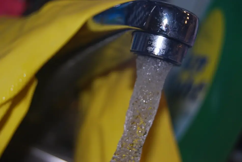 Chrome faucet with running water